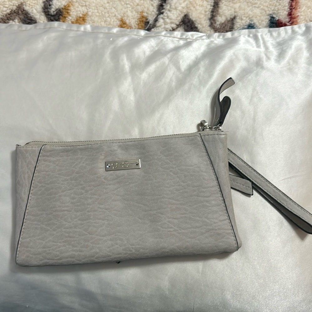 Jessica Simpson wristlet, never used. 11x6x1